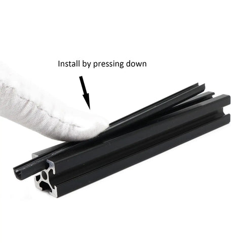 Person pressing down on a 25 Pack 420mm U Slot Panel Mount Bracket for 20 Series 2020 and 2040 extrusions.