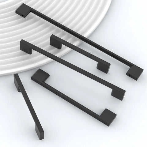 Heavy Duty Matte Black Cabinet Pulls 5 Inch Hole Center Zinc Alloy Kitchen Drawer Handles Set of 10 on a white plate.