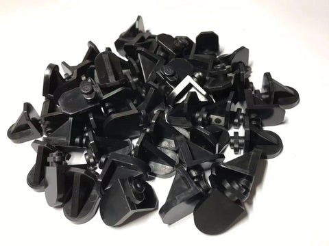 Pile of Twist In Shelf Pins 8 Pack Black Durable 5mm Shaft Angled 3D Printed Pegs For Adjustable Shelving In Kitchen Cabinets