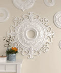 Beefy Ceiling Medallion With Forty And Three Eighths Inch Outer Diameter Inner Opening Six And Five Eighths Inches Projection Two And Seven Eighths Inches Lightweight shown on wall