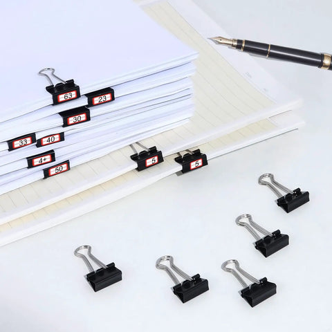 Stacked papers held by 60 Pack Small Binder Clips 3/4 Inch Black Office Paper Clips For Organization Durable Rust Resistant Steel Reusable Standard Size