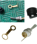 Two Pack Chainsaw Kill Switch Replacement Kit For 45cc To 58cc Gas Engines with metal mounts and shockproof pads on green mat