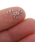 Stainless Steel Flat Washers For Rimless Glasses 100 Pcs Eyeglass Repair Kit For A Pro Grade Secure Sturdy Fit DIY Fixes Sunglasses And Glasses Great For Daily Wear And Office Style, small stainless steel washers on fingertips