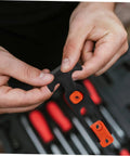 Hands holding Heavy Duty T Handle Hood Latch Kit For Cars Replacement Rubber Material Hasp Latch For TJ Jeeps
