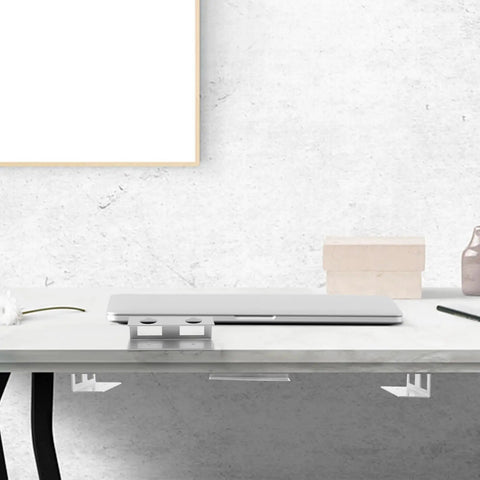Premium Under Desk Laptop Stand Built Like A Tank With Solid Aluminum Bracket Mount Setup For A Super Sleek Office Workspace, featuring a sleek silver laptop atop a modern desk.