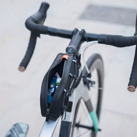 Ride Ready Front Frame Bag for Bikes With Large Capacity Main Compartment mounted on top tube, open to show contents
