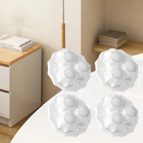 No Sweat Peel And Stick Appliance Casters 8 Pack Built Tough Ball Wheels group on a table, showing white durable casters.