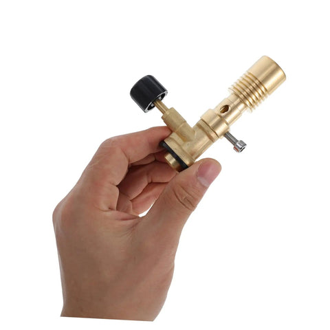 Hand holding Flame Bunsen Burner Portable Gas Blowtorch Head For Propane Cooking Stove Outdoor Heating With Adjustable Flame And Gas Flow Brass Mini Torch For Camping Culinary Searing DIY Projects