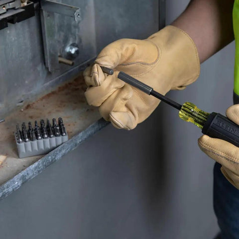 Person using Magnetic Multibit Screwdriver Kit With Torx T7 Through T40 Hex Spanner Tri Wing Torq and Nut Tamperproof Bits