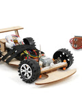 Wireless Remote Control F1 Car Kit For STEM Learning And Kid Friendly Hands On Projects Build, Race, And Explore Science With This DIY Model Car Kit For Kids, Students, And Classrooms, Family Friendly. Wooden F1 car kit with remote control shown with controller