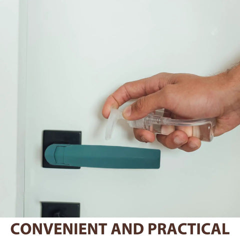 Hand using a spray bottle on a Heavy Duty Green Plastic Oven Handle Replacement for Commercial Food Service Equipment.