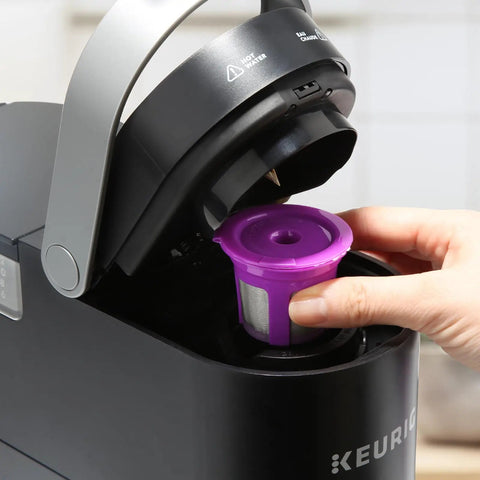 Inserting reusable K Cup pod in Keurig with 360 Count Disposable K Cup Filters For Keurig 1.0 And 2.0 Single Serve Brewers.