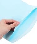 Hand holding self adhesive light blue envelope from 15 pack for letter sized documents thickened paper pockets easy to use