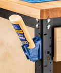 Upside Down Glue Bottle Dock Station With One Handed Access For 4oz 8oz And 16oz Bottles, Built In Opener on workbench corner