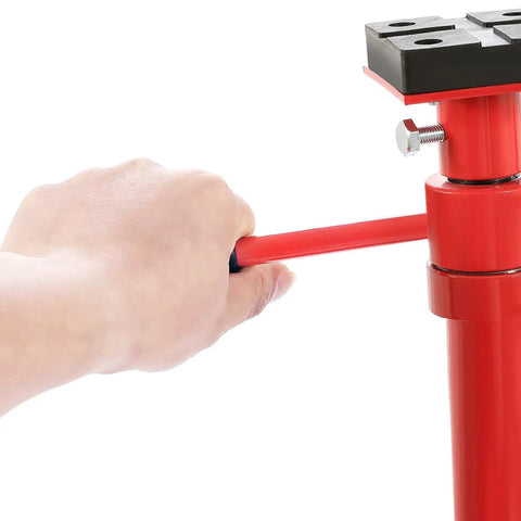 Rugged Adjustable Under Hoist Tripod Stand Built Like A Tank With Heavy Duty Steel And Quick Screw Adjustment For High Lift 2 Ton Automotive Shop Support shown in use with hand adjusting screw.