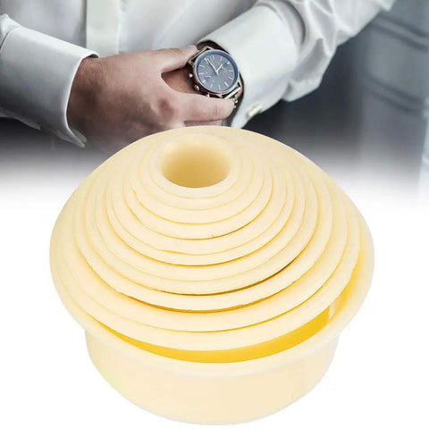 12 Piece Watch Movement Support Set With 12 Assorted Movement Holders for DIY watch repair next to a man wearing a watch