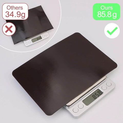 Pro Grade All In One Magnetic Sheets on scale showing weight comparison, highlighting thicker design for stamp and die storage.