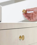 Hand installing Brass Cabinet Knobs Set 30 Pack 1 Inch Gold Drawer Pulls For Dresser Kitchen Cabinets With Durable Zinc Construction