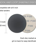 5 inch hook and loop sanding disc with P1000 grit labeling shown, part of the 50 Pcs 5 Inch Hook And Loop Sanding Discs Set With 320 400 600 800 1000 Grit Pro Grade Wet Dry Sandpaper Assortment Silicon Carbide For Random Orbital Sander And Auto Wood Metal Polishing focus set.