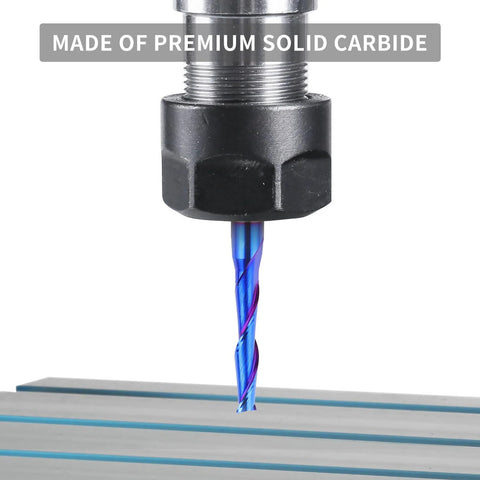 Close-up of blue-coated solid carbide upcut spiral router bit, 3/16" diameter, 1/4" shank, cutting into wood.