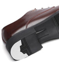 Tough As Nails Shoe Heel Pads 4Mm Thick Rubber Non Skid Adhesive Repair Kit applied to brown shoe sole for grip.