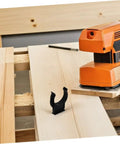 No Drama Hidden Toe Kick Clips For Kitchen Cabinets And Furniture Legs 50 Piece Heavy Duty Plastic Baseboard Fasteners on wood surface.