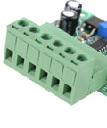 Close-up of 0 To 5V And 0 To 10V Analog Input To PWM Converter with Dual Outputs, showing terminals, green connector, industrial controller ready.