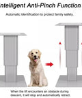 Automatic Electric Table Lift For RV Dinette With Folding Legs And Wireless Remote Control shows anti-pinch function with table and dog.