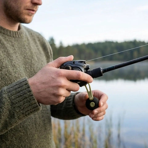 Sweet Fishing Reel Handle Replacement Kit With Comfortable Eva Grip Knob And Rocking Arm Universal Fit For Spinning Reels Perfect Upgrade For Fish Lovers Who Want A Tighter And Smoother Cast Every Single Time. 103mm EVA grip on baitcasting reel by lake