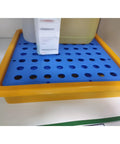 No Sweat Spill Containment Pallet For Standard Fifty Five Gallon Barrel, blue and yellow plastic tray for fluid containment.