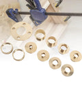 Dead Nuts Accurate Solid Brass Router Guide Kit with Eleven Precision Template Bushings shows brass bushings for precision routing.