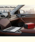 150 Watt Power Inverter Transforms 12V Dc To 110V Ac With Cigarette Lighter Plug And Dual Usb Charging Ports For Camp Builds Road Trips And Mobile Office Hustle in car with laptop.
