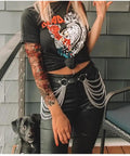 Edgy Layered Belly Chain Made From Distressed Leather And Antique Alloy Links worn with black leather pants and graphic tee.