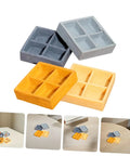 Four Grid Miniature Resin Storage Box Set For Dollhouses And Fairy Gardens shown in multicolor on a table.