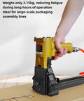 Best Pneumatic Carton Sealer For Fast Shipping Lightweight Air Powered Box Nailer With Adjustable Depth And Tension Zinc Aluminum Alloy Body High Speed Packaging Tool For 15 To 18mm Tape in use with a hand gripping the air-powered device.