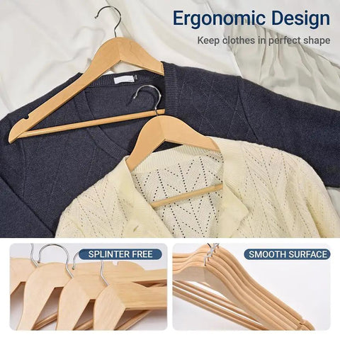 Straight Up Premium Quality Natural Wooden Coat Hangers Thirty Pack Flat Profile Wood Suit Hangers with sweaters placed on them.