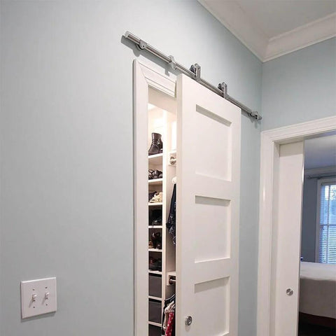Heavy Duty Stainless Steel Sliding Barn Door Hardware Kit With 6.6ft Track For A Single Door Indoor Outdoor Rail System Delivers Smooth Operation Built To Last Modern Home Upgrade For Style And Function installed in a closet opening