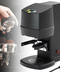 Automatic Espresso Tamper Electric Tamping Station 58mm Portafilter Compatible view showcasing adjustable pressure dial and smooth base.