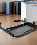 Slick Under Desk Keyboard Tray Featuring Smooth Glide Retractable Slides For A Dead Simple Space Saving Home Office Setup And Clutter Free Workstation Built Tough For Daily Use on a desk.