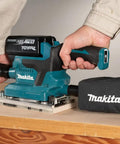 Badass Brushless Orbital Finishing Sander With Push Button Three Stage Electronic Speed And High Orbit Rate For Slick Wood Smoothing And Fast Prep Work Tool Only in use on wood panel.