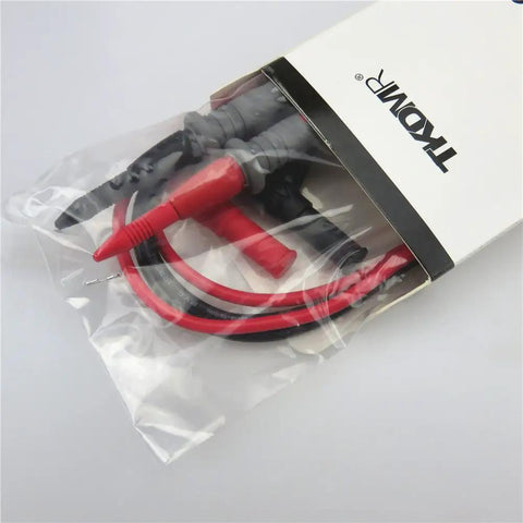 Ultra Sharp Multimeter Probe Leads Kit With Gold Plated Test Probes, packaged, showing red and black leads in plastic bag.