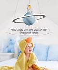 Image of a Space Themed Astronaut Pendant Light For Kids Room Dimmable Planet LED Chandelier With baby in a duck towel.