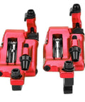 Rock Solid Top Tier Hydraulic Disc Brake Set Featuring Two Way Paddle Levers And Sturdy Aluminum Alloy Calipers For Front Rear Mountain Bike Ebike Setup Ready To Roll In Bright Red Finish, detailed view of calipers.