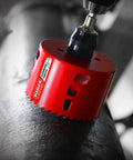 Carbide Teeth Hole Saw For Wood And Metal With 3 Inch Diameter shown in use on metal surface
