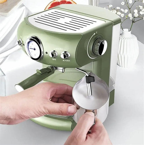 19 Bar Espresso Machine With Milk Frother brewing coffee, person frothing milk, green design on kitchen counter