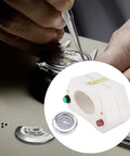 Watch Demagnetizer And Compass Kit For Mechanical Watches 2 In 1 Dope Professional Demagnetizing Tool showcased in repair setting