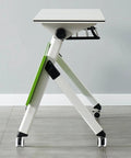 Heavy Duty Folding Computer Desk With Flip Top Layout And Four Sleek Rolling Casters, white surface, green accent, side view.
