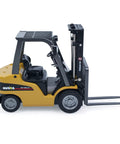 Mini Warehouse RC Forklift Model 9925 With Realistic Light And Sound Effects Precise Steering Lift Lower Function Plus Remote Control Operation For Indoor Play side view with operational forks.