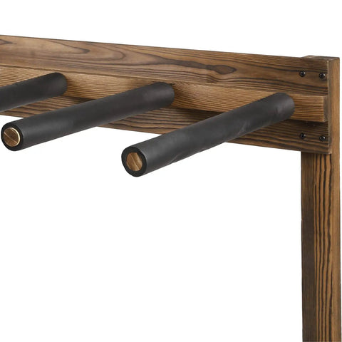 Close-up of the Rustic Burnt Wood Freestanding Surfboard Rack, black padded arms, vertical stand, indoor storage for four boards.