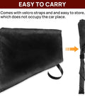 Heavy Duty Magnetic EV Charger Cover Built Like A Tank To Shield Your Electric Ride From Grit And Downpours Sealed All Weather Port Guard With Beefy Magnets In Durable Matte Black, folded with velcro straps for easy storage.